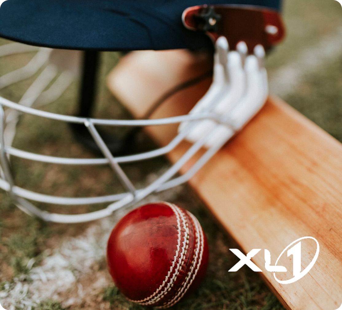 XL1 cricket equipment including helmet, bat, ball and gloves showcasing quality sports gear